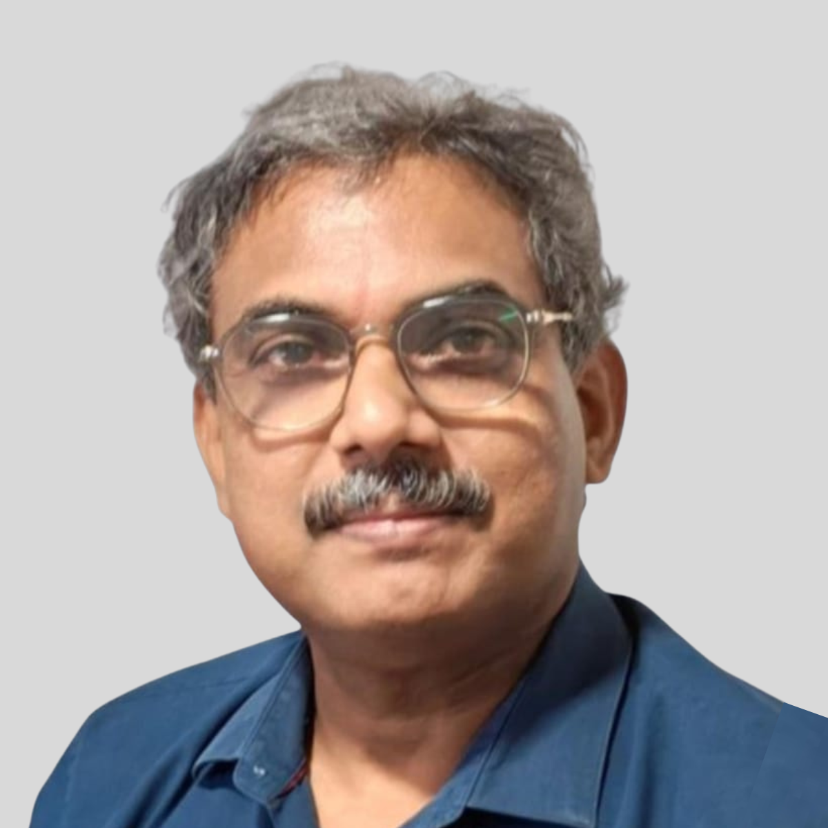 Dr. K. Dinesh